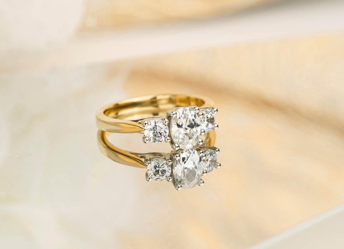 3 Stone 1.25ct Natural Diamond Ring-Oval center in 18ct Gold