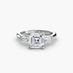 Solitaire Ring with tapered Baguettes