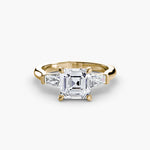 Solitaire Ring with tapered Baguettes