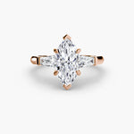 Solitaire Ring with tapered Baguettes
