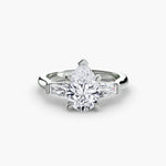Solitaire Ring with tapered Baguettes