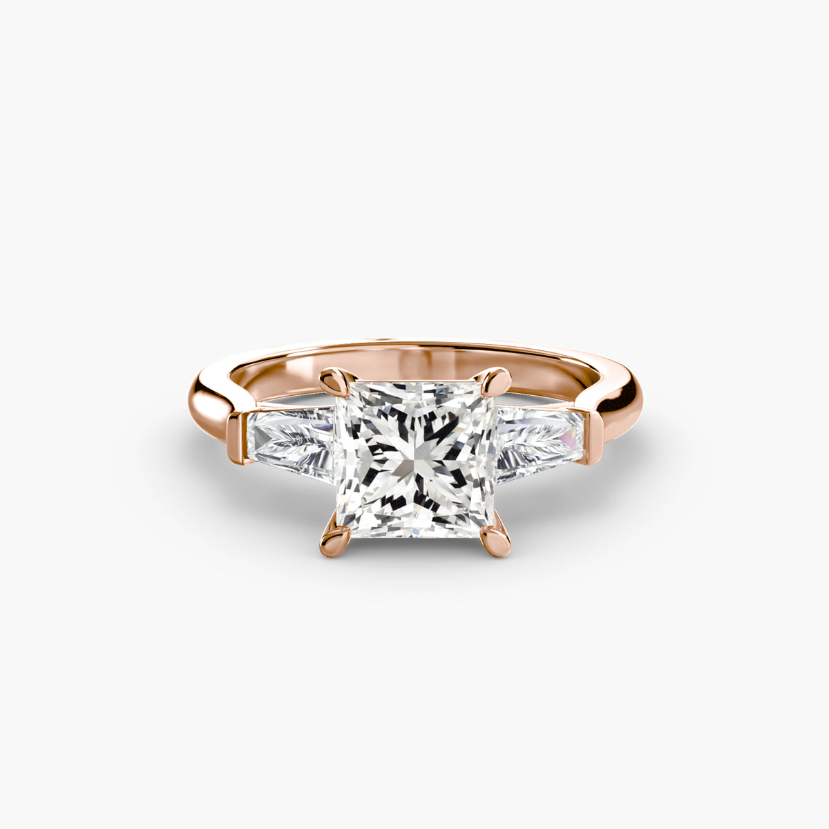 Solitaire Ring with tapered Baguettes