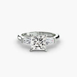 Solitaire Ring with tapered Baguettes