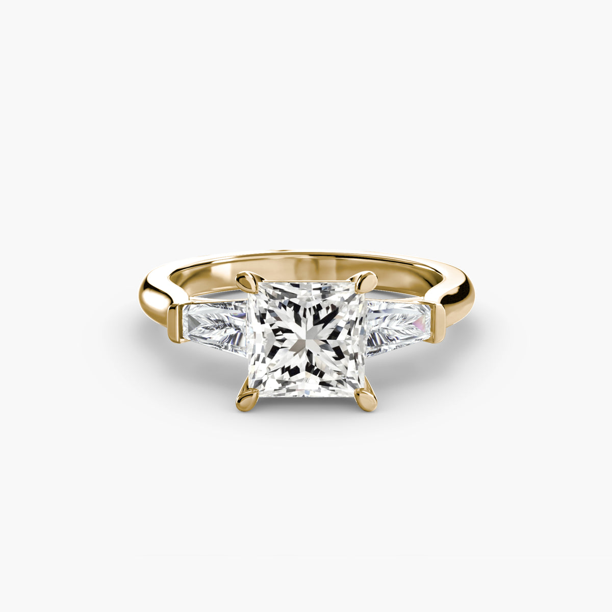 Solitaire Ring with tapered Baguettes