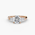 Solitaire Ring with tapered Baguettes