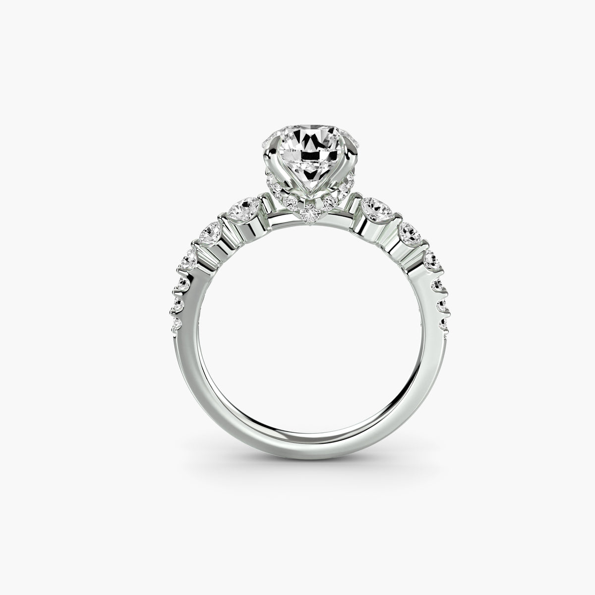 Solitaire with tapered side stones & pave details