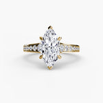 Solitaire with channel set side stones