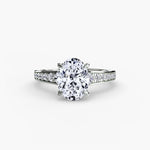 Solitaire with channel set side stones