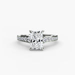Solitaire with channel set side stones