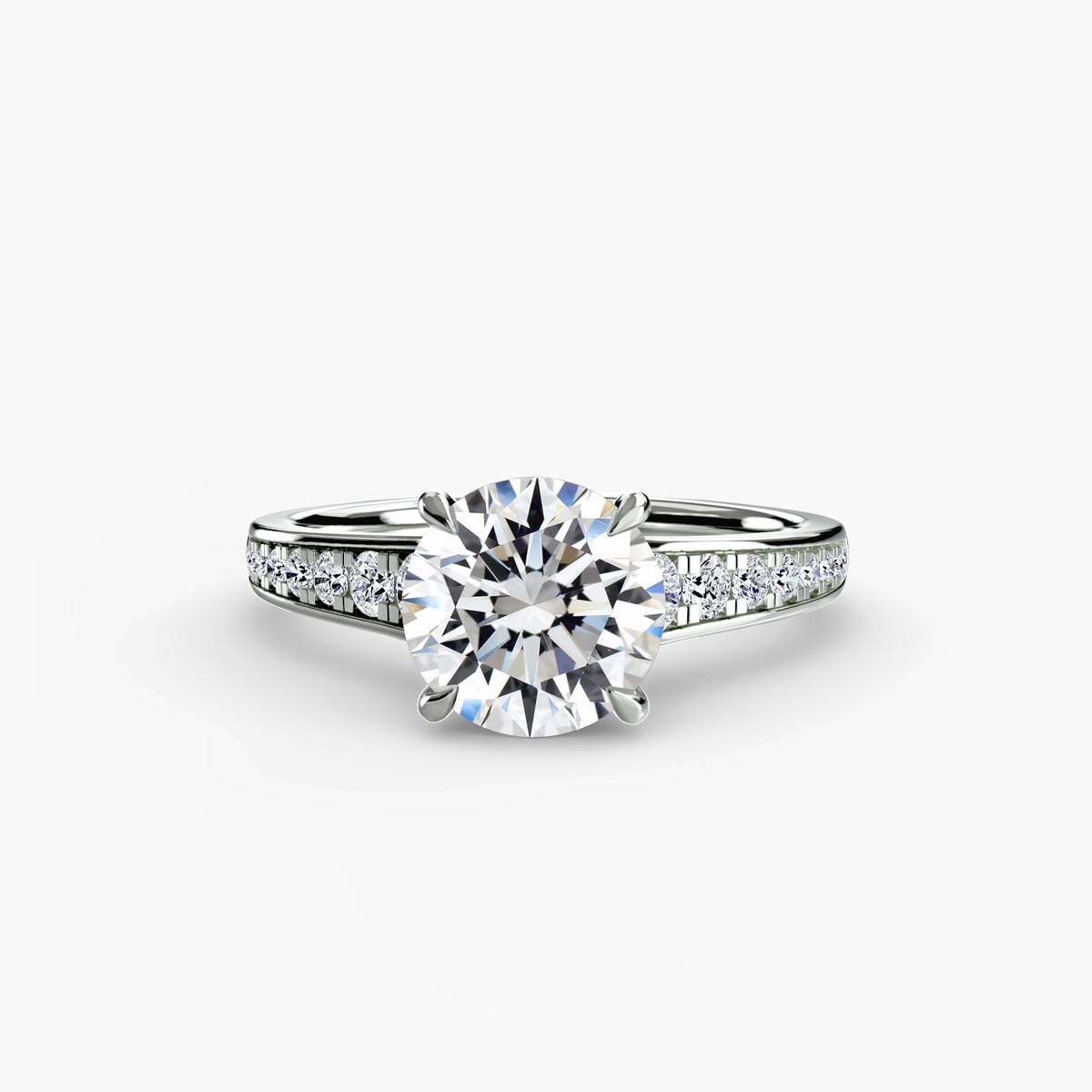 Solitaire with channel set side stones