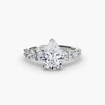 Diamond Solitaire with Graduated Accent shoulders