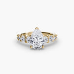 Diamond Solitaire with Graduated Accent shoulders