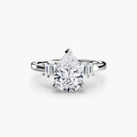 Solitaire with Baguette Accent Shoulders