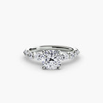Solitaire ring with fancy sides