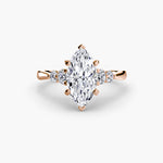Diamond Solitaire with 4 accent stones.