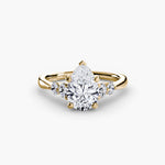 Diamond Solitaire with 4 accent stones.