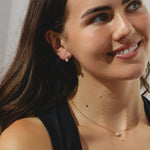 9ct gold stud drop earrings with tworound-cut 1.10ct diamonds each.