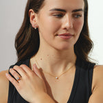 9ct gold stud drop earrings with tworound-cut 1.10ct diamonds each.