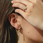 9ct gold drop earrings with four cascading oval-cut 1.78ct diamonds.