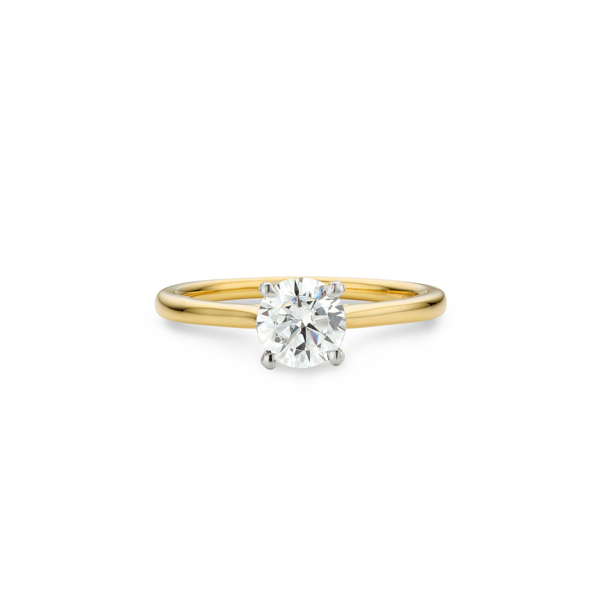 A round lab diamond solitaire ring set in a 18ct gold band with a classic 4 claw setting.
