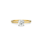 A round lab diamond solitaire ring set in a 18ct gold band with a classic 4 claw setting.