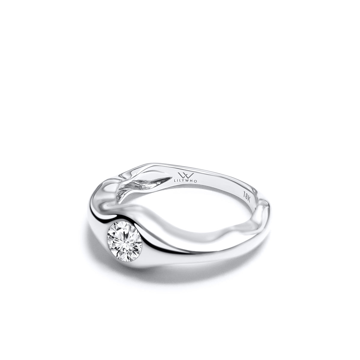 0.50ct Round Diamond set in an organic shape Platinum band