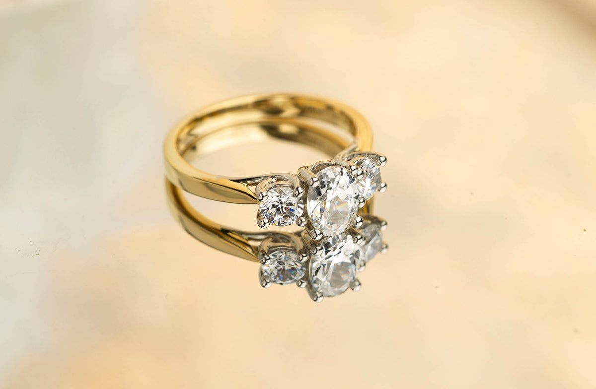 3 Stone 1.25ct Natural Diamond Ring-Oval center in 18ct Gold