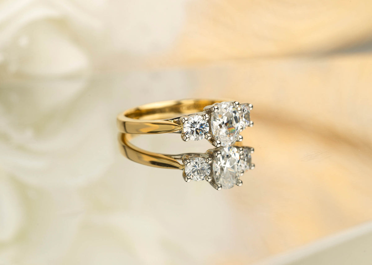 3 Stone 1.25ct Natural Diamond Ring-Oval center in 18ct Gold