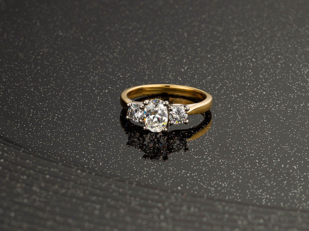 3 Stone 1.25ct Natural Diamond Ring-Oval center in 18ct Gold