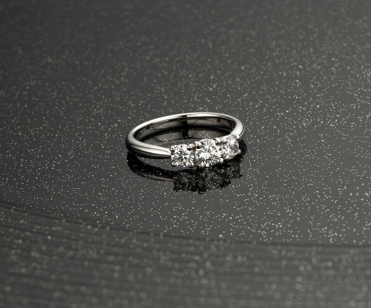 3 stones .65ct Natural Diamond Ring in Platinum