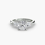 Solitaire Ring with tapered Baguettes