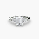 Solitaire Ring with tapered Baguettes