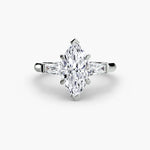 Solitaire Ring with tapered Baguettes