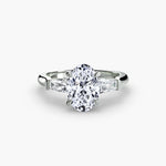 Solitaire Ring with tapered Baguettes