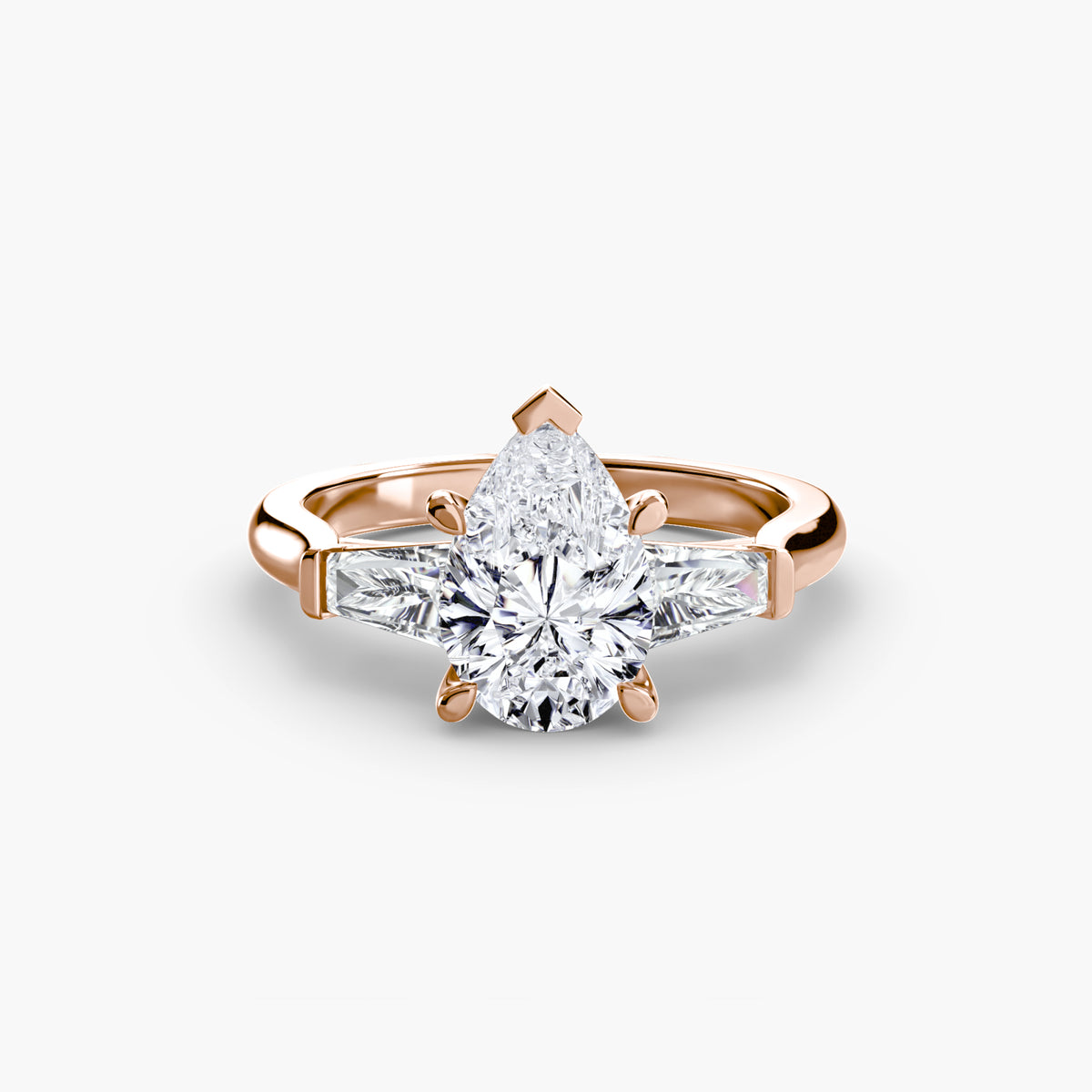 Solitaire Ring with tapered Baguettes