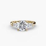 Solitaire Ring with tapered Baguettes