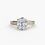 Solitaire with channel set side stones