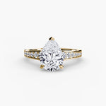 Solitaire with channel set side stones