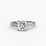 Solitaire with channel set side stones