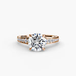 Solitaire with channel set side stones