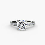 Solitaire with channel set side stones