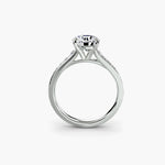 Solitaire with channel set side stones