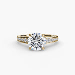 Solitaire with channel set side stones