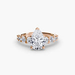 Diamond Solitaire with Graduated Accent shoulders