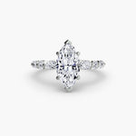 Solitaire ring with fancy sides