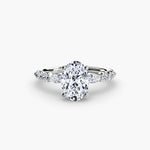 Solitaire ring with fancy sides