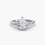 Diamond Solitaire with 4 accent stones.
