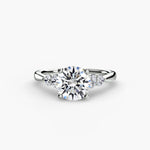 Diamond Solitaire with 4 accent stones.