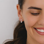 pendant earrings with two round cubic zirconia gemstones in three clawed silver settings
